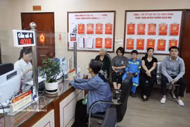 两级地方政府模式获得民群和企业的支持。图自越通社