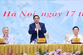 越南政府总理范明政出席会议。图自越通社