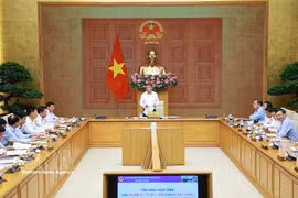 越南政府总理黎明兴29日主持召开与建设部的工作会议。图自越通社