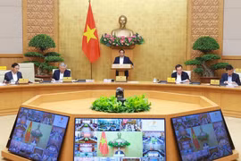 越南政府总理范明政在政府3月份例行会议和政府与各地方视频会议上发表讲话。图自越通社