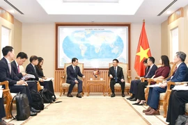 双方会见现场。图自越通社