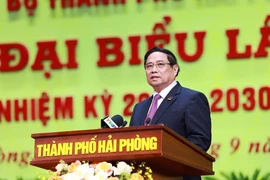越南政府总理范明政在会上发言。图自越通社