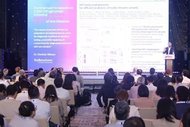 会议场景。图自越通社