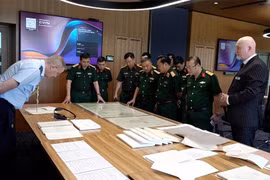 越南国家515号指委会工作代表团在首都堪培拉与澳大利亚陆军遗骸搜寻委员会举行了工作会谈。图自越通社