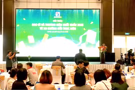 研讨会现场。图自人民报