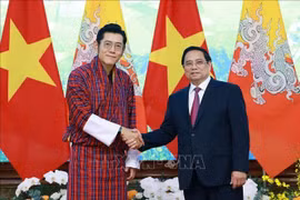 越南总理范明政会见不丹国王吉格梅。图自越通社