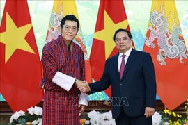 越南总理范明政会见不丹国王吉格梅。图自越通社