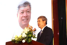 岘港市人民委员会副主席胡光宝。图自越通社