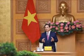 范明政总理在会上发言。图自越通社