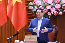 越南政府总理范明政主持召开会议。图自越通社