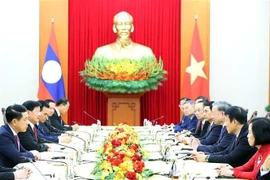 双方会见现场。图自越通社