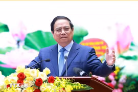 范明政总理在会上发表讲话。图自越通社