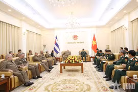 双方会见现场。图自人民军报