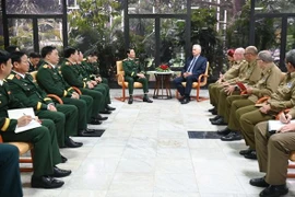 阮新疆大将一行与古共中央第一书记、国家主席米格尔·迪亚斯-卡内尔举行会谈。图自越通社