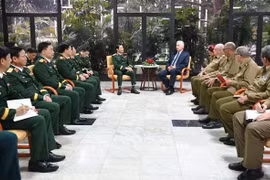 阮新疆大将一行与古共中央第一书记、国家主席米格尔·迪亚斯-卡内尔举行会谈。图自越通社