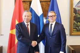 越共中央总书记苏林会见芬兰总理彼得里·奥尔波。图自越通社
