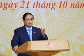 越南政府总理范明政主持召开会议。图自越通社