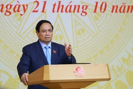 越南政府总理范明政主持召开会议。图自越通社