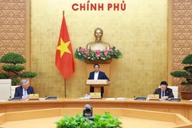 范明政总理在会上发表讲话。图自越通社