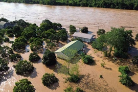 资料图：洪水导致马江水位上涨，致使多个地方严重受淹。图自越通社