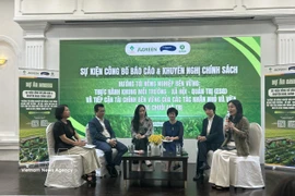 各位专家进行交换意见。图自越通社