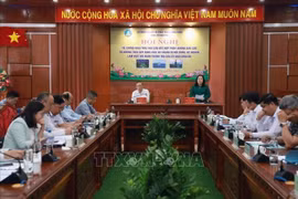 会议场景。图自越通社