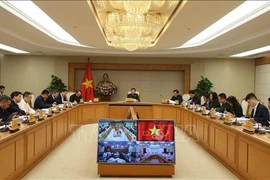 会议现场。图自越通社