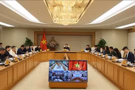 会议现场。图自越通社