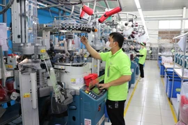 由韩国投资建设的一家生产厂。图自越通社