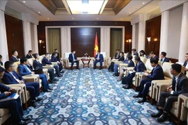 越南政府总理范明政同中国一流集团领导进行工作会谈