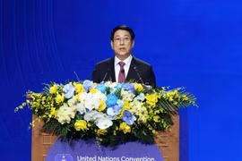 越南国家主席梁强主持仪式。图自越通社