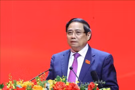 政府总理范明政主持会议。图自越通社