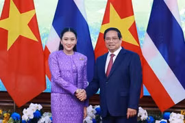 越南政府总理范明政与泰国总理共同主持召开第四次越泰联合内阁会议。图自越通社