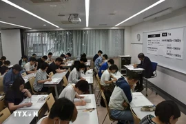 参考的考生。图自越通社