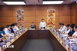 会议场景。图自越通社