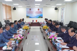 双方会议现场。图自越通社