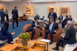 金砖国家峰会:范明政会见中国国务院总理李强