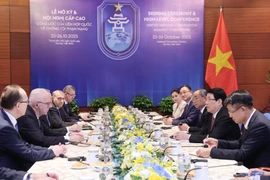 河内公约:越南国家主席梁强会见国际客人