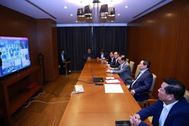 范明政总理与国内各省市举行视频会议，部署救援抢险及灾后恢复工作。图自 越通社