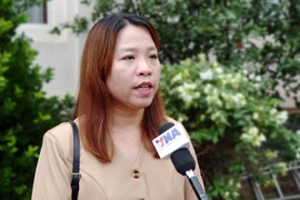 征求越共十四大文件草案意见：老挝越侨心系大会进程