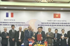 2025-2028年翰林院-法国国家科学研究中心行动计划签署仪式。图自越通社
