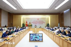 会议现场。图自越通社