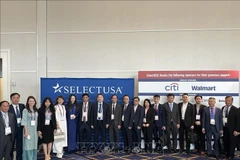 与会代表合影。图自越通社