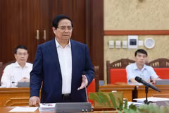 越南政府总理范明政主持中央政治局第二工作组与西宁和宣光两省省委常务委员会的工作会议。图自越通社