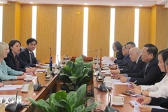 会谈现场。图自越通社