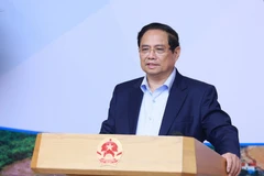 越南政府总理、国家重点交通工程指导委员会主任范明政在会上发言。图自越通社