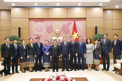 双方代表合影。图自越通社