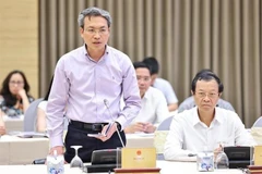 越南公安部办公厅主任、公安部发言人阮国瓒发言。图自越通社