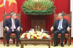越共中央总书记苏林会见墨菲石油公司董事长兼首席执行官埃里克·汉布利。图自越通社