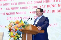 越南政府总理范明政发言。图自越通社